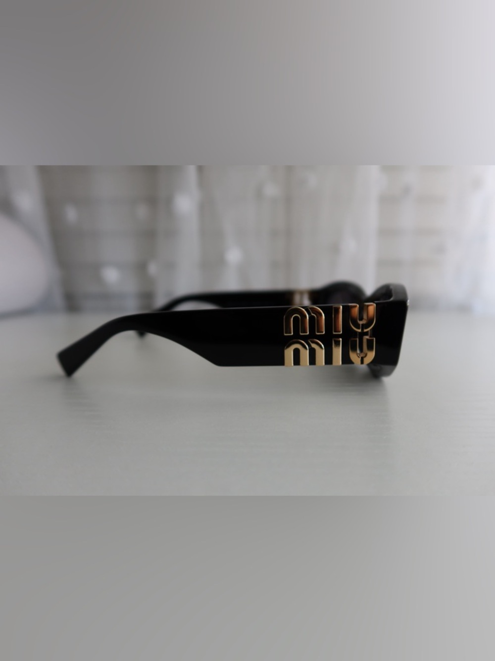 Miu Miu Black Cat-Eye Sunglasses with Velvet Pouch - Picture 4 of 9